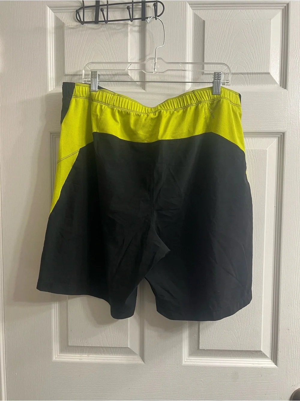 The North Face Men's Black Swim Shorts with Neon Yellow Side Panels